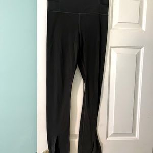 Athleta Aura split pants in greenish gray color, size M